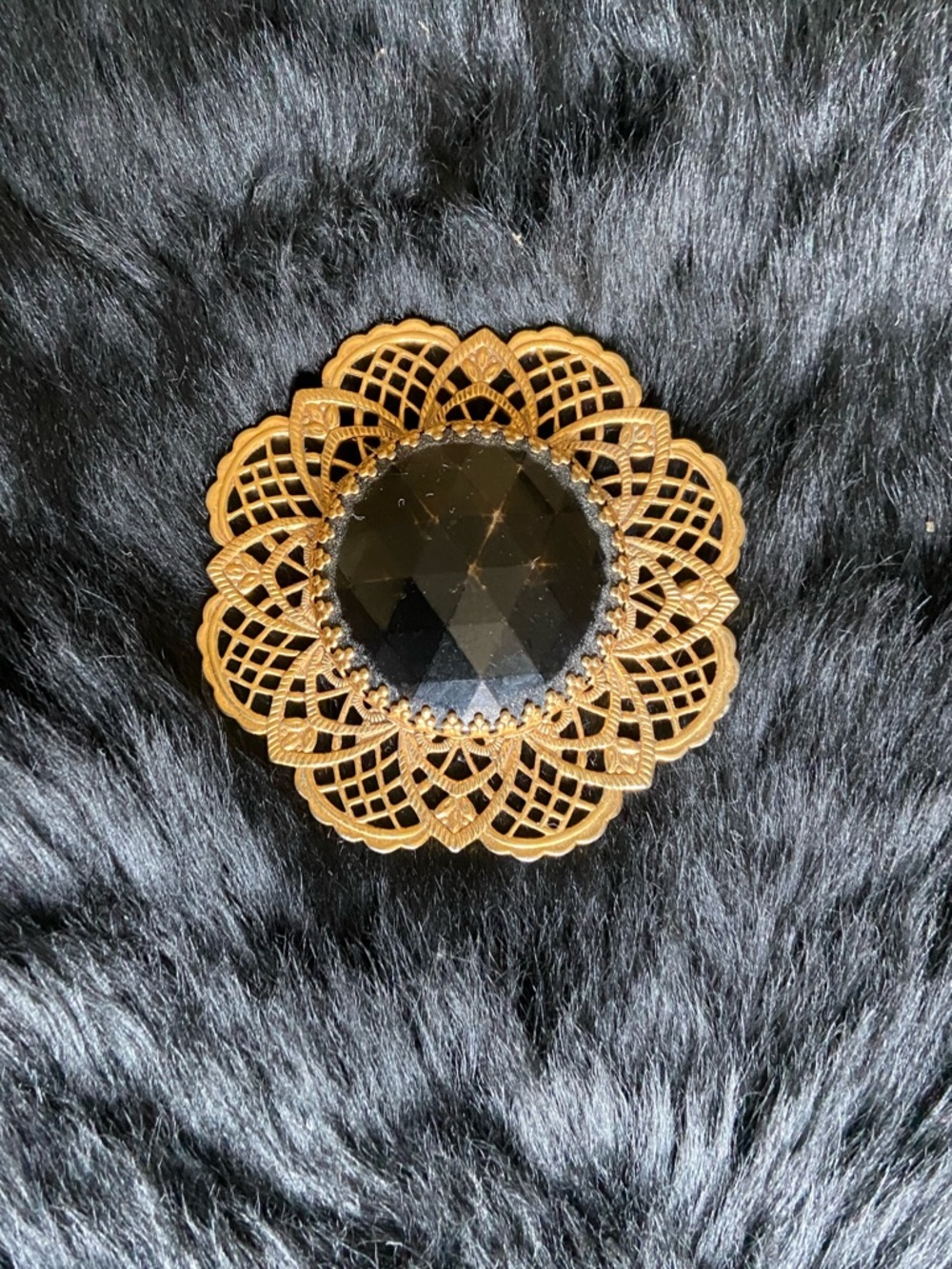 Gold Filigree Brooch with Black Faceted Center